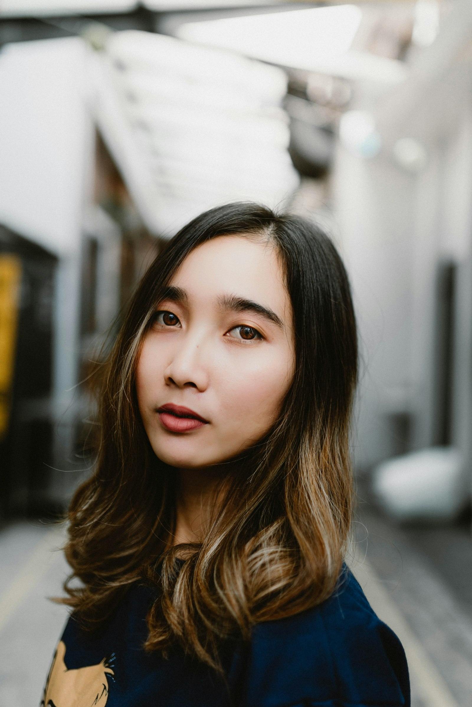 Lightened hair turning warm golden-yellow through the mid-lengths and ends — the brassiness purple shampoo is meant to cancel